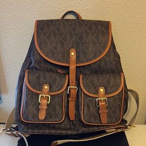 Michael Kors Brown Tan Backpack with Monogram Pattern